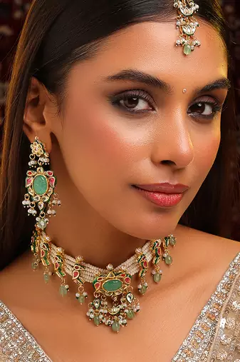 Gold plated kundan multicolor stones necklace set with maang tikaa