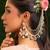 Gold plated kundan green stones chain earrings