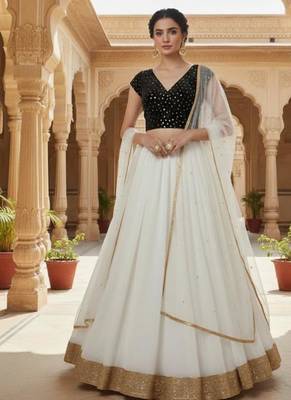 White Lehenga set with dupatta and lace detailing 1