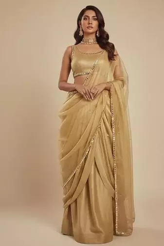 light gold festive lehenga set with choli and dupatta