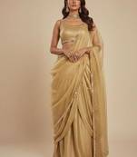 light gold festive lehenga set with choli and dupatta