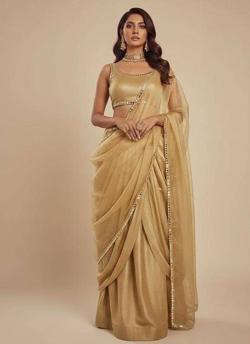 light gold festive lehenga set with choli and dupatta
