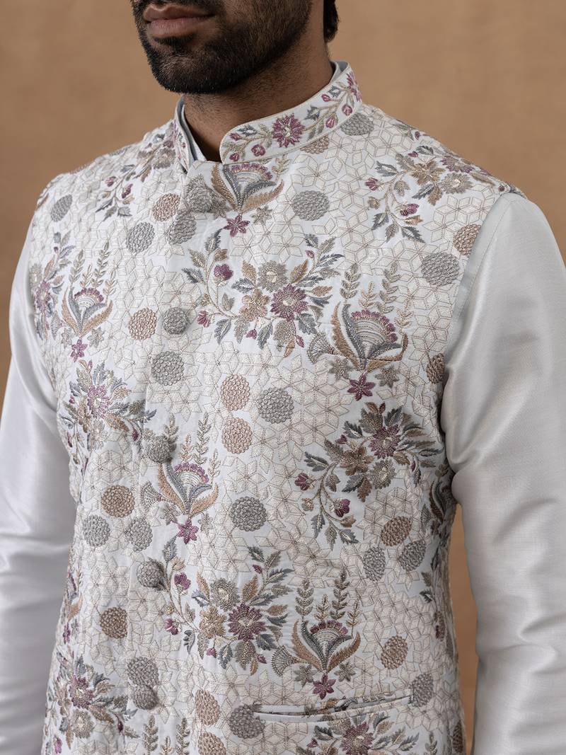 Ice blue floral embroidered bundi with kurta set