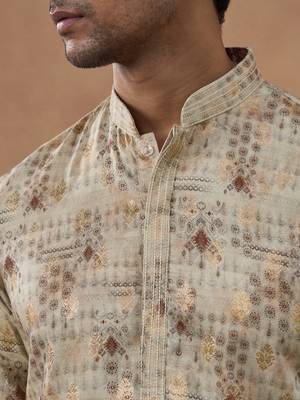 Beige kurta set with subtle gold detailing 2