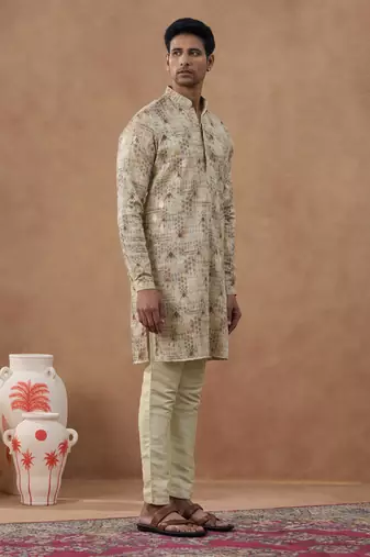 Beige kurta set with subtle gold detailing