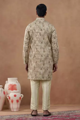 Beige kurta set with subtle gold detailing