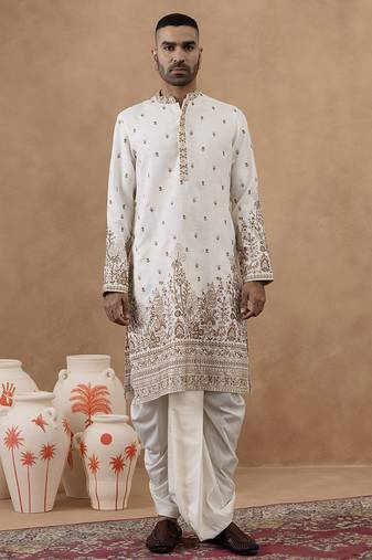 Cream kurta with detailed front machine embroidery