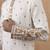 Cream kurta with detailed front machine embroidery