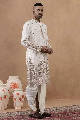 Cream kurta with detailed front machine embroidery