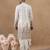 Cream kurta with detailed front machine embroidery