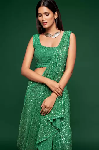 Mint green georgette saree with thread & multiple sequins embroidery