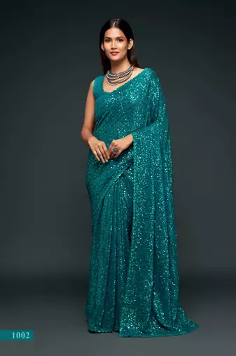 Teal blue georgette saree with thread & multiple sequins embroidery