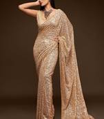 Ivory georgette saree with thread & multiple sequins embroidery