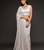 White georgette saree with thread & multiple sequins embroidery