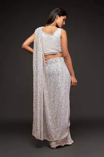 White georgette saree with thread & multiple sequins embroidery