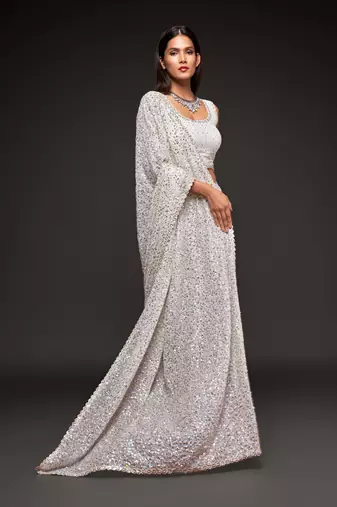 White georgette saree with thread & multiple sequins embroidery