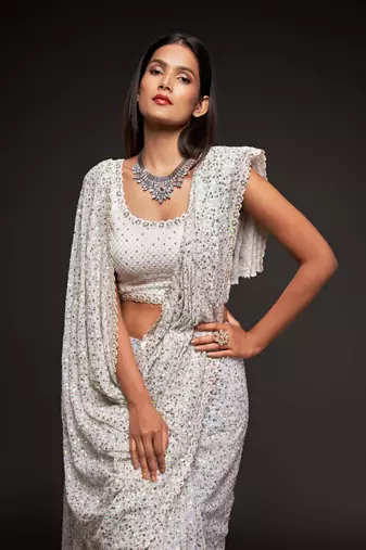 White georgette saree with thread & multiple sequins embroidery