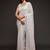 White georgette saree with thread & multiple sequins embroidery