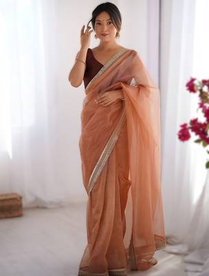 Orange exclusive dual shade gold net sequins saree with lace border 1