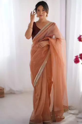 Orange  exclusive designer dual shade gold net sequins saree with lace border