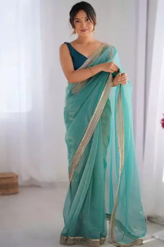 Sky blue exclusive designer dual shade gold net sequins saree with lace border