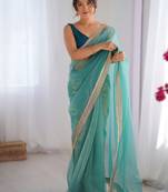 Sky blue exclusive designer dual shade gold net sequins saree with lace border