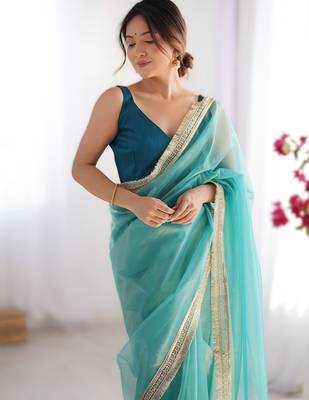 Sky blue exclusive dual shade gold net sequins saree with lace border 4
