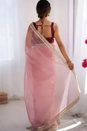 Pink exclusive dual shade gold net sequins saree with lace border