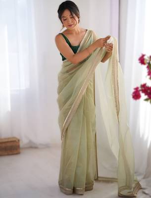Green exclusive dual shade gold net sequins saree with lace border 1