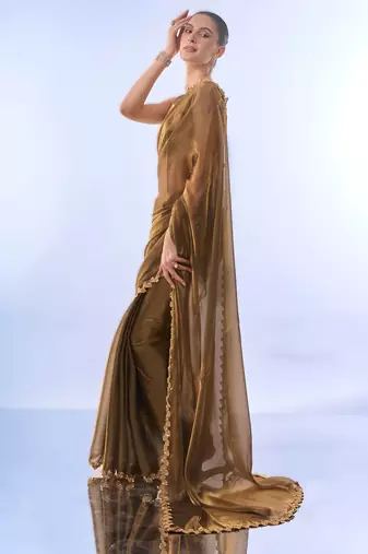 Gold bollywood style soft organza saree with sequins lace border
