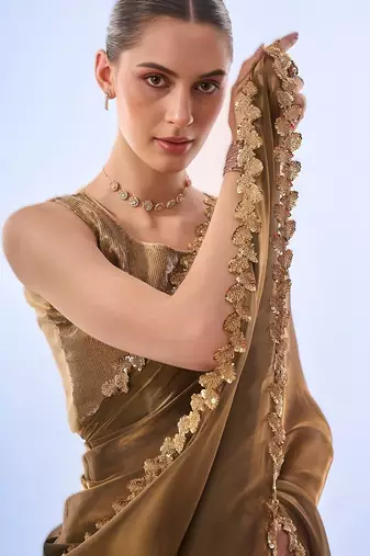 Gold bollywood style soft organza saree with sequins lace border