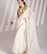 White bollywood style designer soft organza saree with sequins lace border