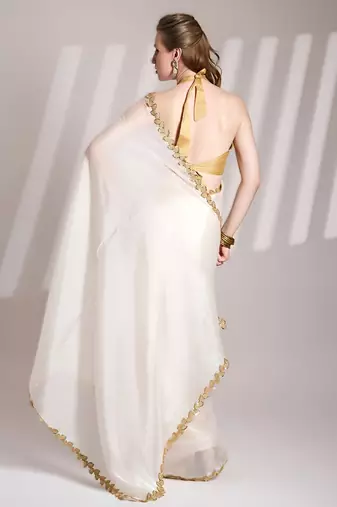 White bollywood style soft organza saree with sequins lace border