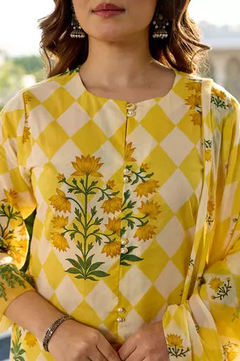  yellow floral and geometric a-line button yoke design kurta trouser dupatta set