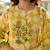 Yufta yellow floral and geometric a-line button yoke design kurta trouser dupatta set