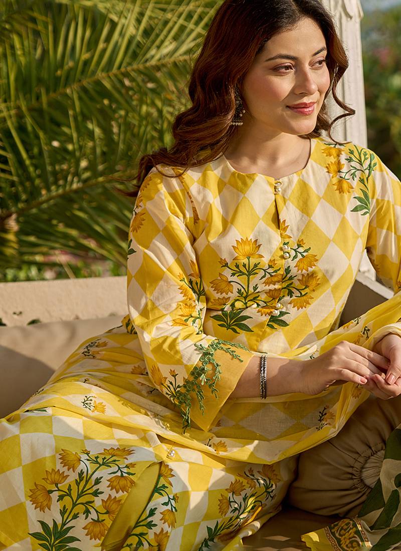 Yufta yellow floral and geometric a-line button yoke design kurta trouser dupatta set