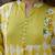 Yufta yellow floral and geometric a-line button yoke kurta trouser dupatta set