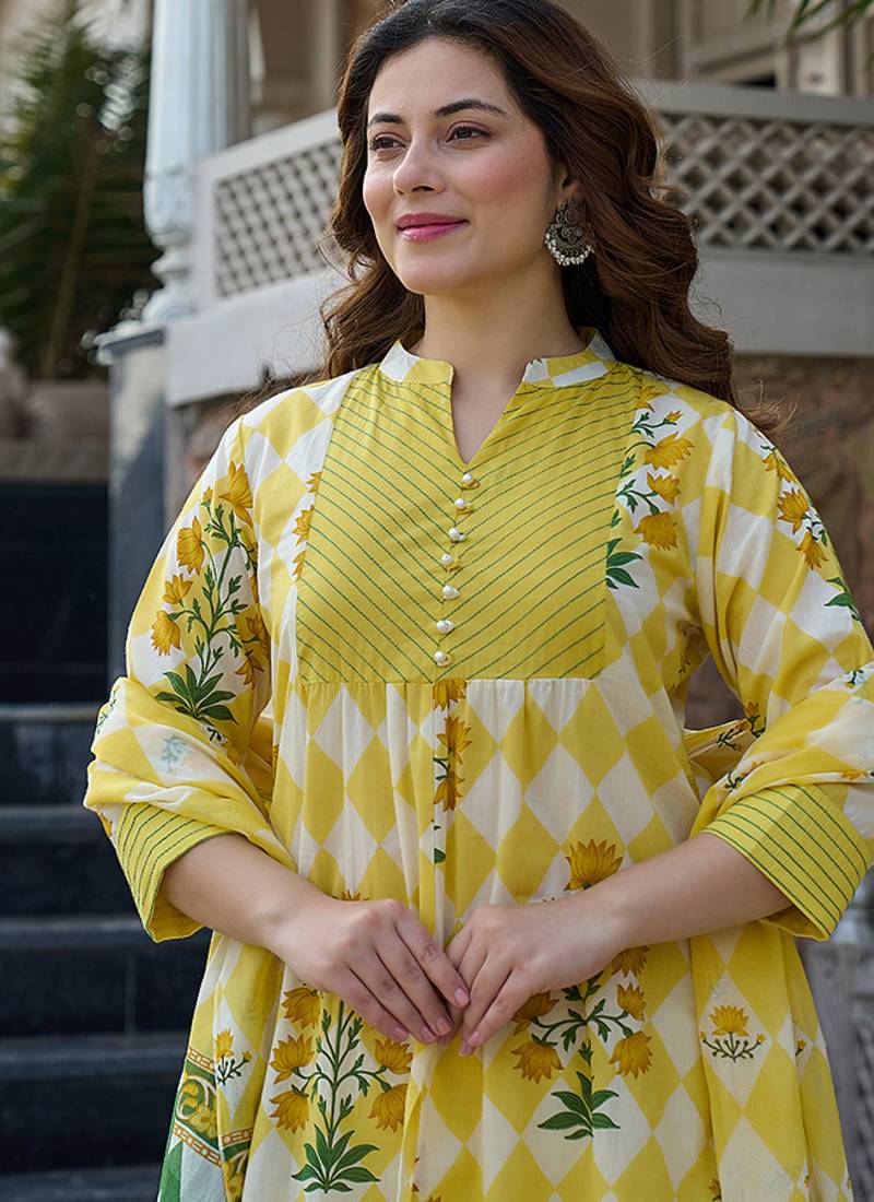 Yufta yellow floral and geometric a-line button yoke kurta trouser dupatta set