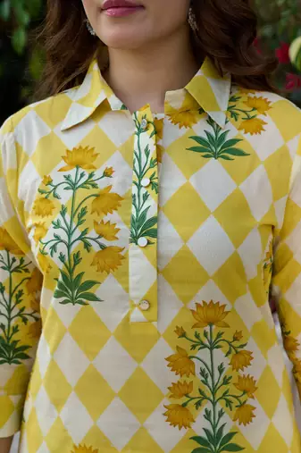  yellow floral and geometric straight button yoke kurta trouser set