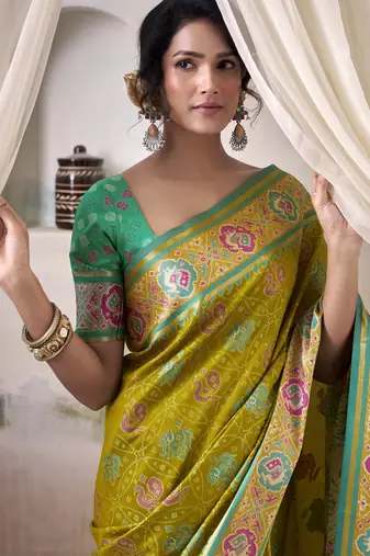 neon patola silk blend patola saree with unstitched blouse piece