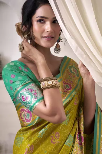 neon patola silk blend patola saree with unstitched blouse piece