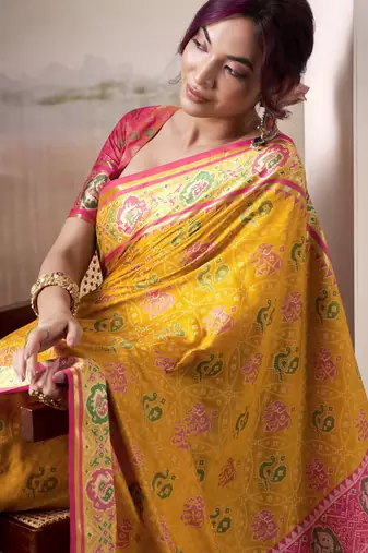 yellow patola silk blend patola saree with unstitched blouse piece
