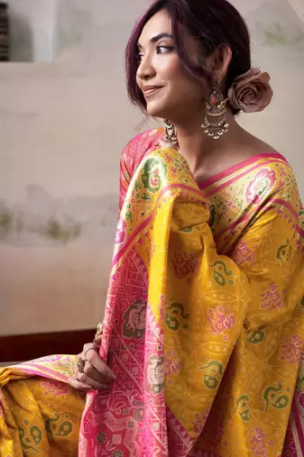 yellow patola silk blend patola saree with unstitched blouse piece