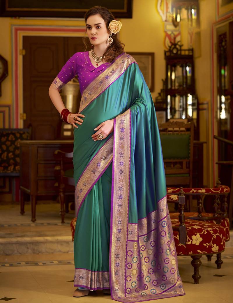 teal soft silk blend woven saree with unstitched blouse piece