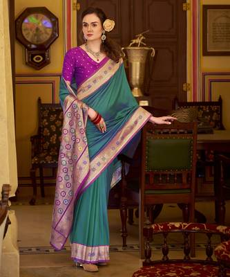 teal soft silk blend woven saree with unstitched blouse piece 2