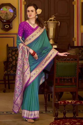 teal soft silk blend woven saree with unstitched blouse piece