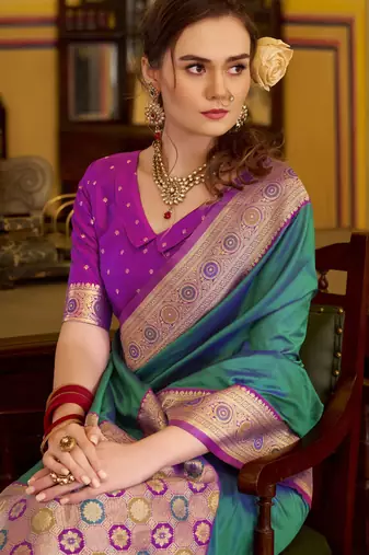 teal soft silk blend woven saree with unstitched blouse piece