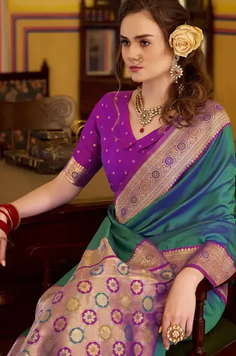 teal soft silk blend woven saree with unstitched blouse piece
