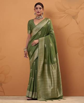 green tissue silk blend woven saree with unstitched blouse piece 1