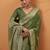 green tissue silk blend woven saree with unstitched blouse piece